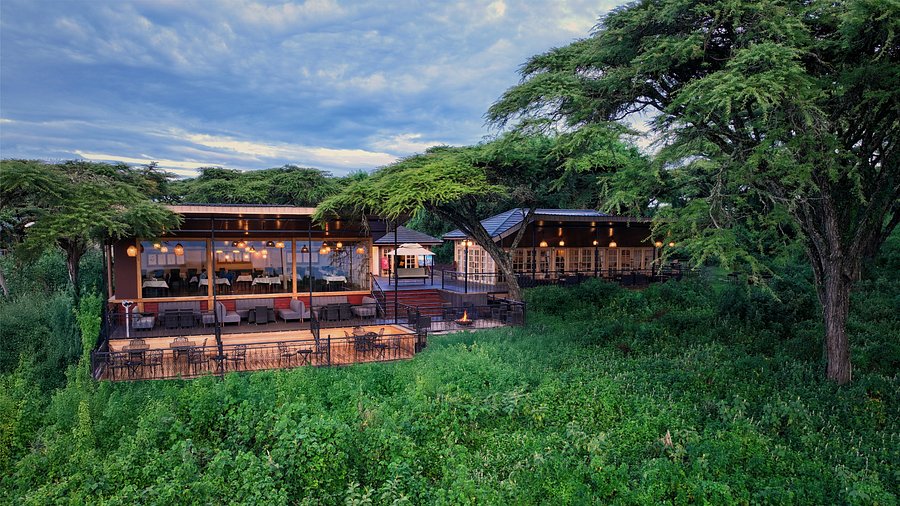 Luxury tented lodge at Ngorongoro Crater with pool and sunset views
