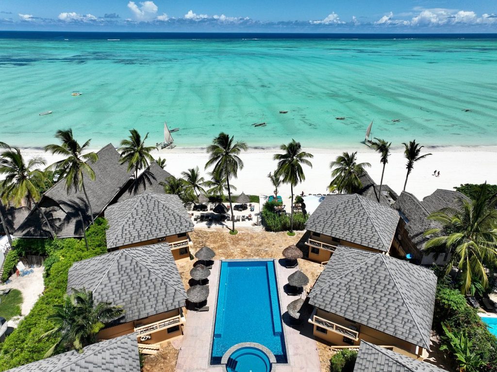 Budget-friendly Zanzibar guesthouse near the beach with palm trees