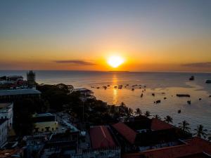 Stone Town Zanzibar sunset skyline overlooking the Indian Ocean