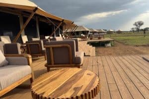 Luxury tent exterior at Dove Serengeti Camp surrounded by Serengeti plains, Tanzania