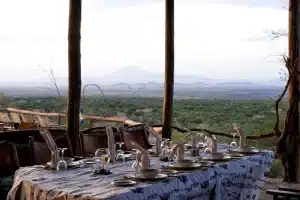Dining area at Kambi ya Tembo safari camp serving local and international food