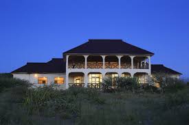 Lake Eyasi Safari Lodge exterior with lake and savannah view