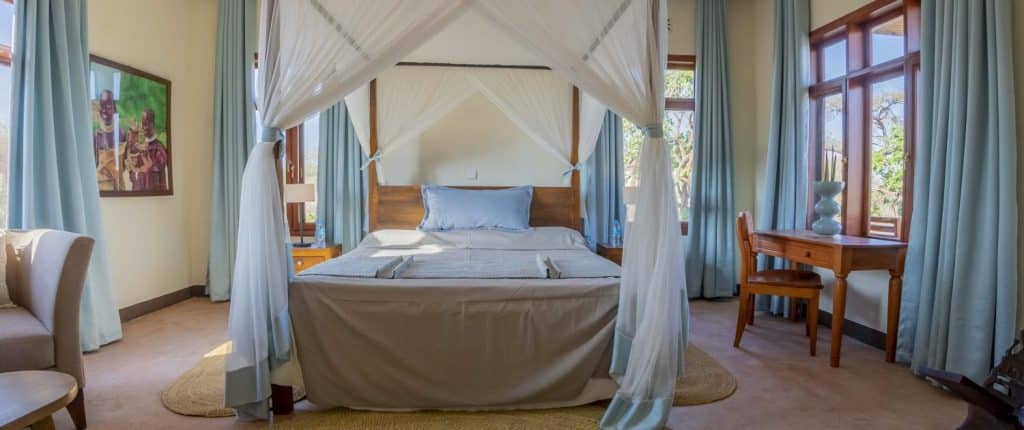 Interior of Lake Eyasi Safari Lodge showing cozy room with lake view
