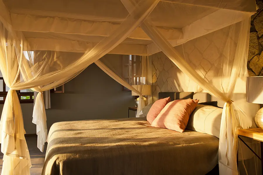 Kitela Lodge room interior luxury cottage Karatu Tanzania comfortable stay
