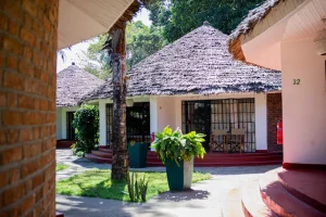 Ilboru Safari Lodge Arusha Tanzania garden lodge surrounded by trees and greenery