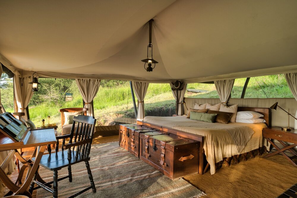 Serengeti Pioneer Camp luxury tent interior safari accommodation Tanzania